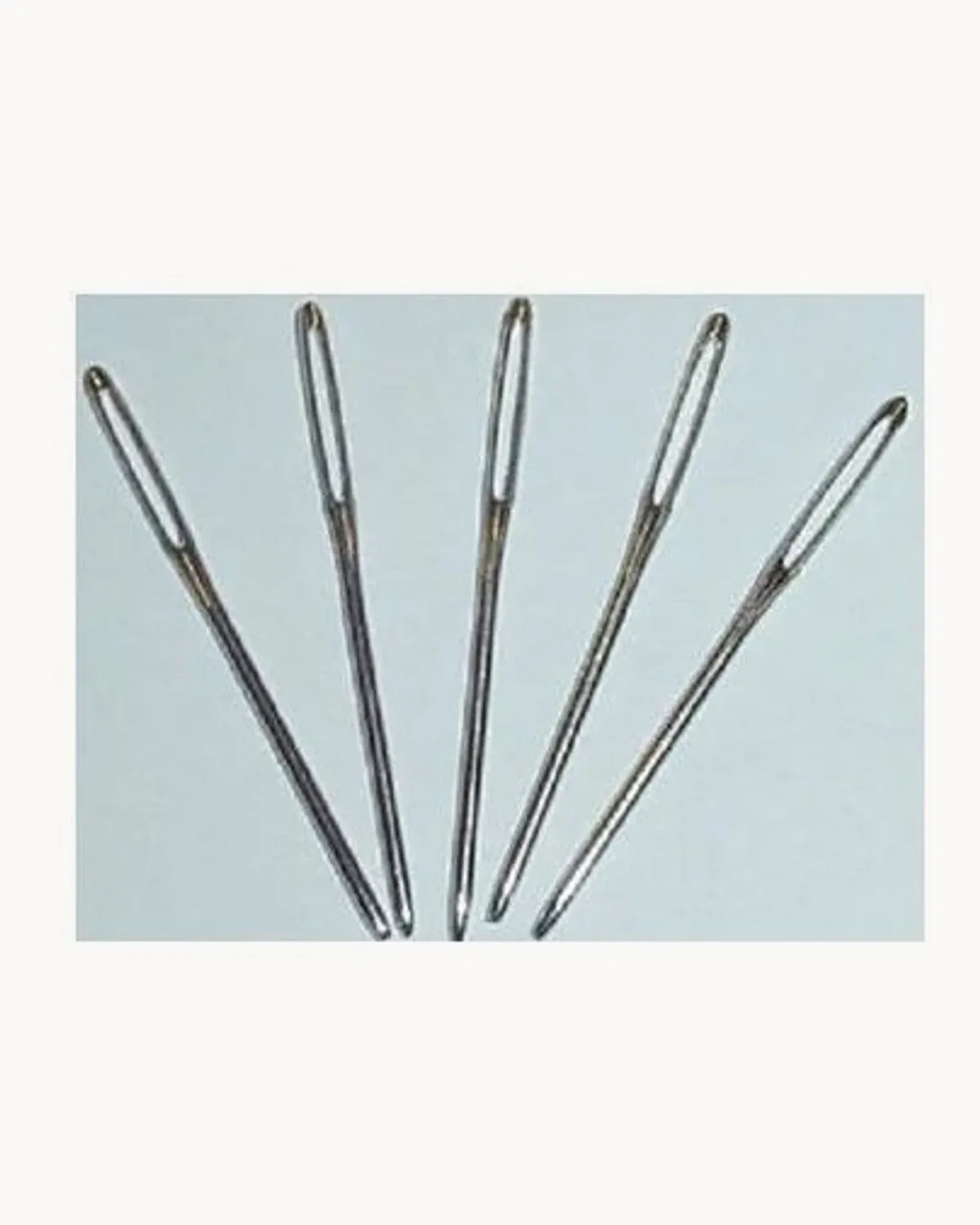 Five long blunt-tipped tapestry needles with large eyes