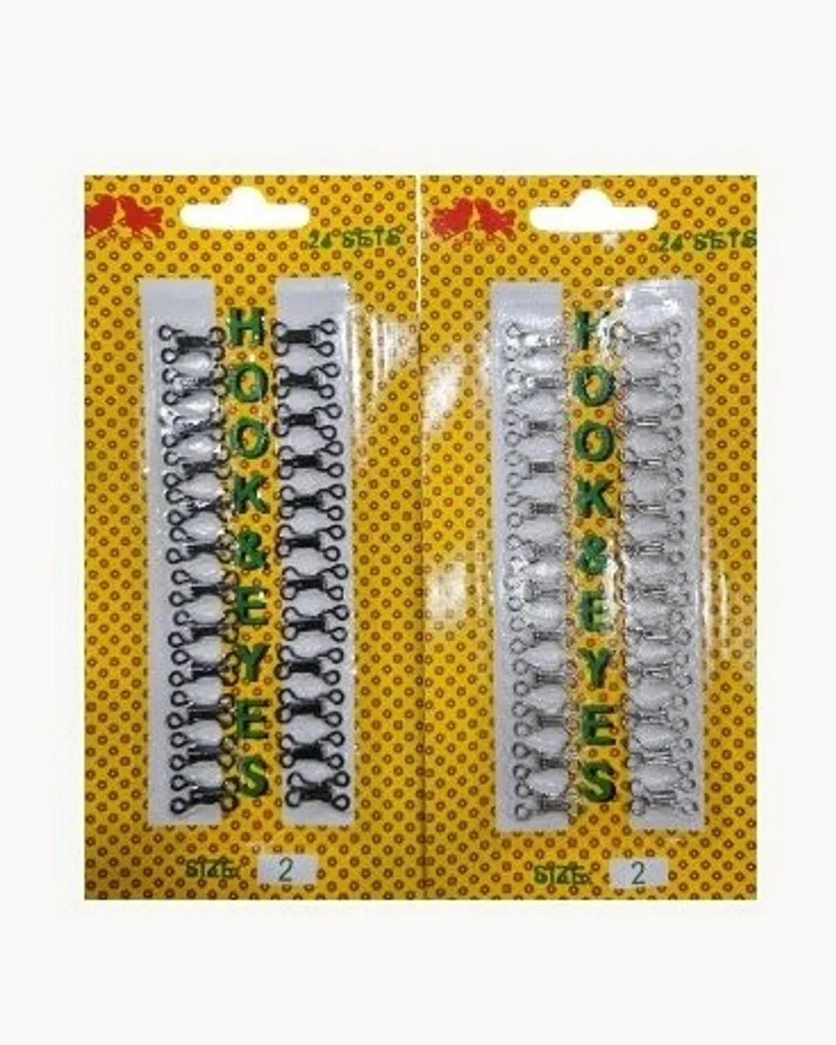 Two carded strips of black and silver hook-and-eye fasteners