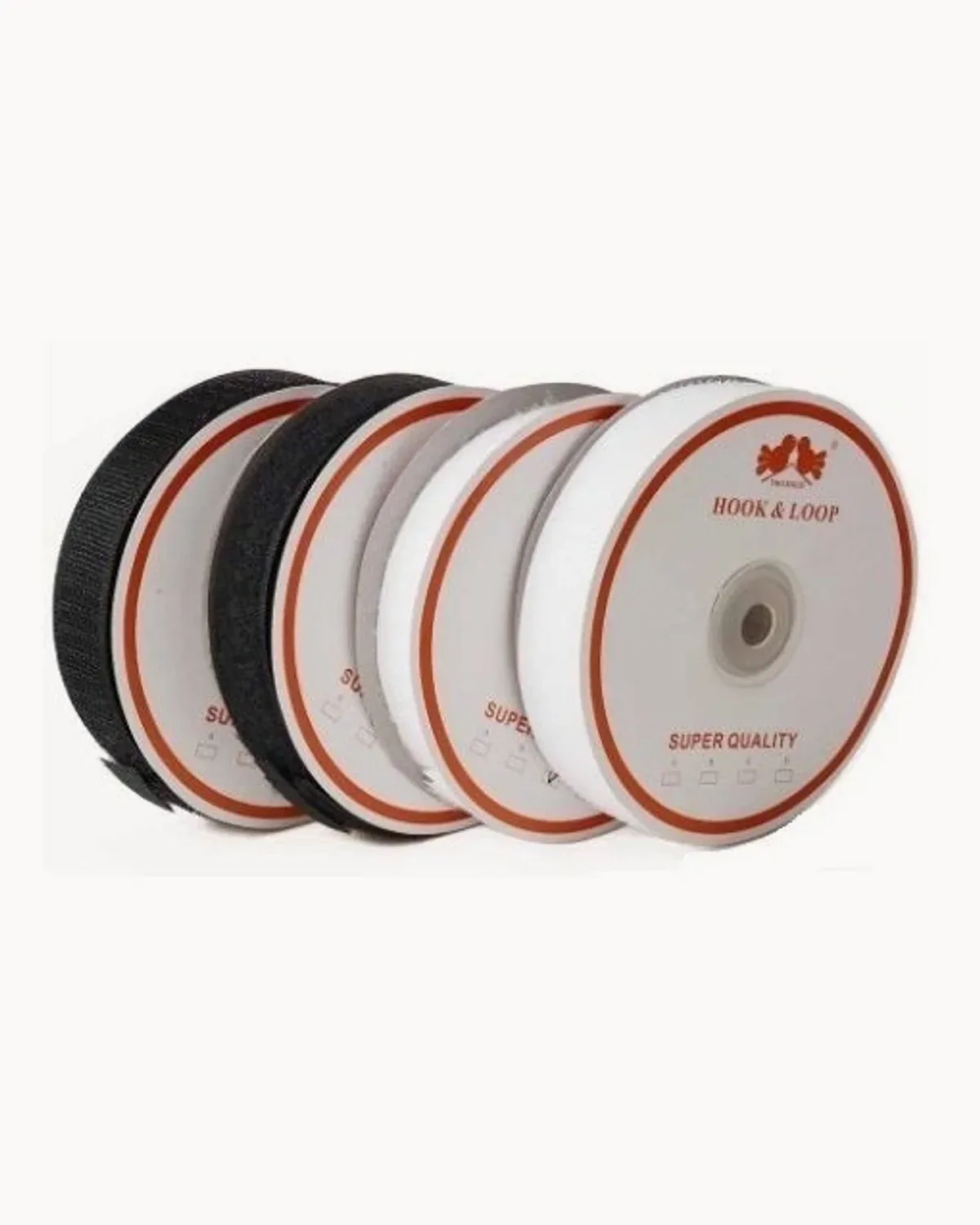 Four rolls of hook-and-loop tape in black and white
