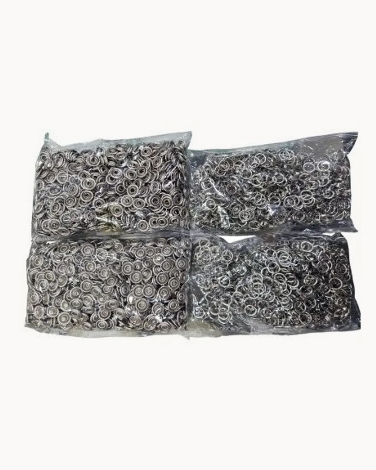Four bagged bulk lots of small metal eyelet snap rings