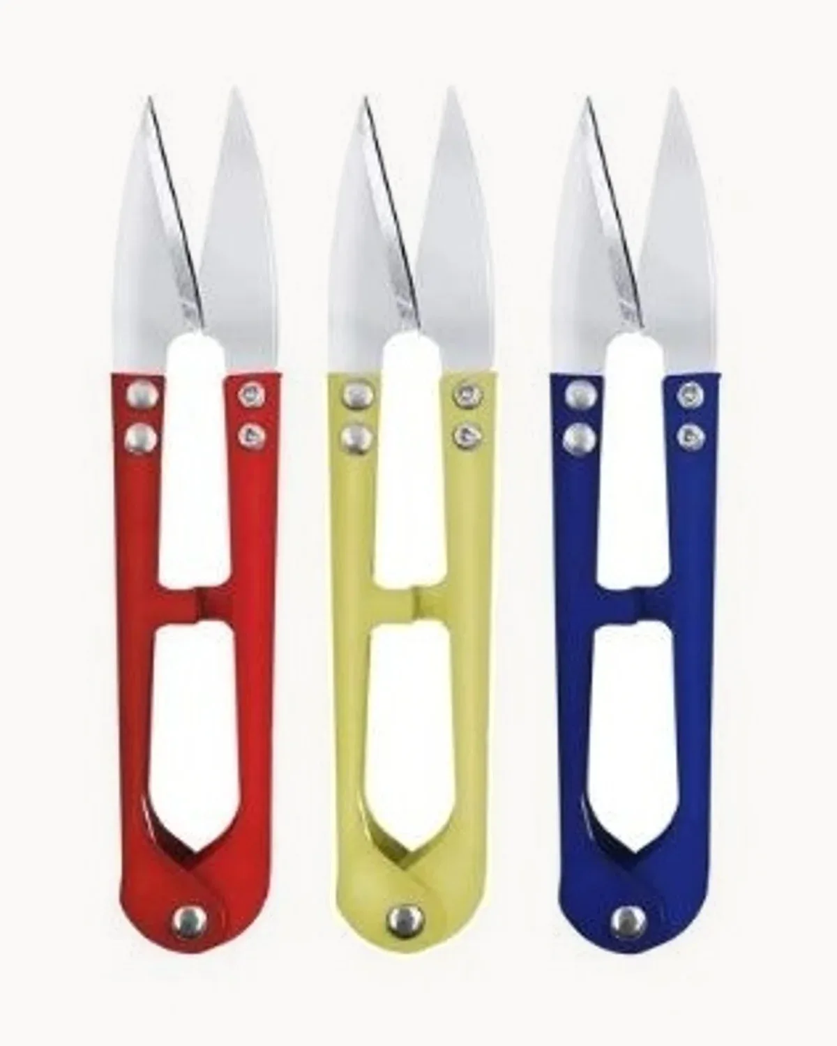 Three sprung metal thread snips with red, yellow and blue handles
