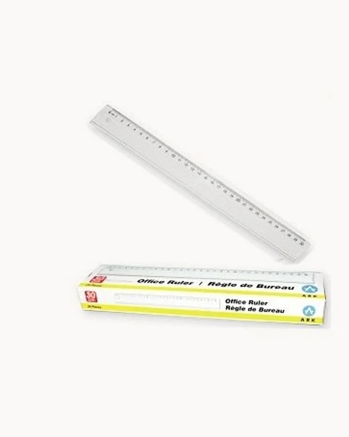 A clear 60 cm office ruler above its retail carton
